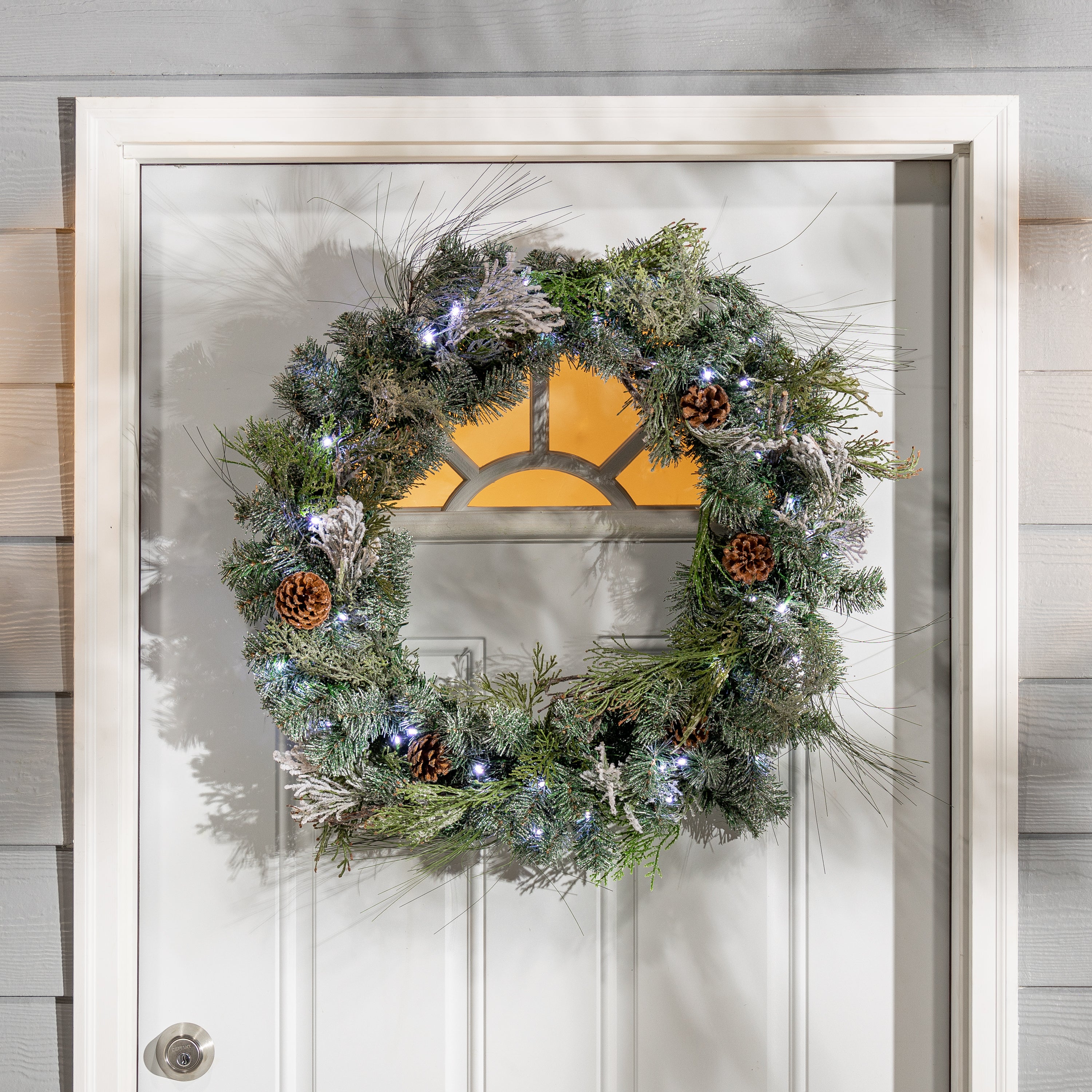 32"D Pre-Lit Snowy Mixed Pine Wreath withPine Cones, Twig & Cedar Accents. 50 Cool White LED Lights.